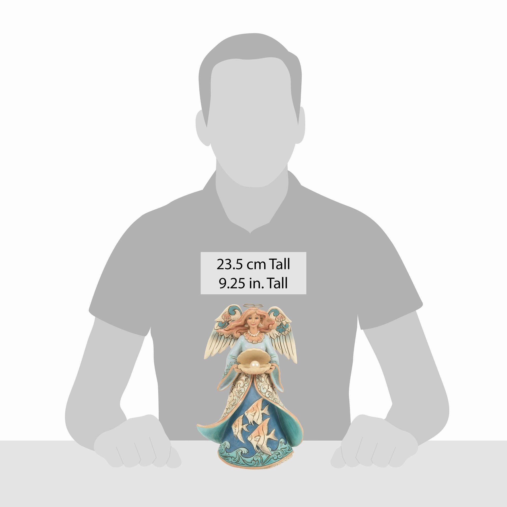 Angel Holding Shell Figurine