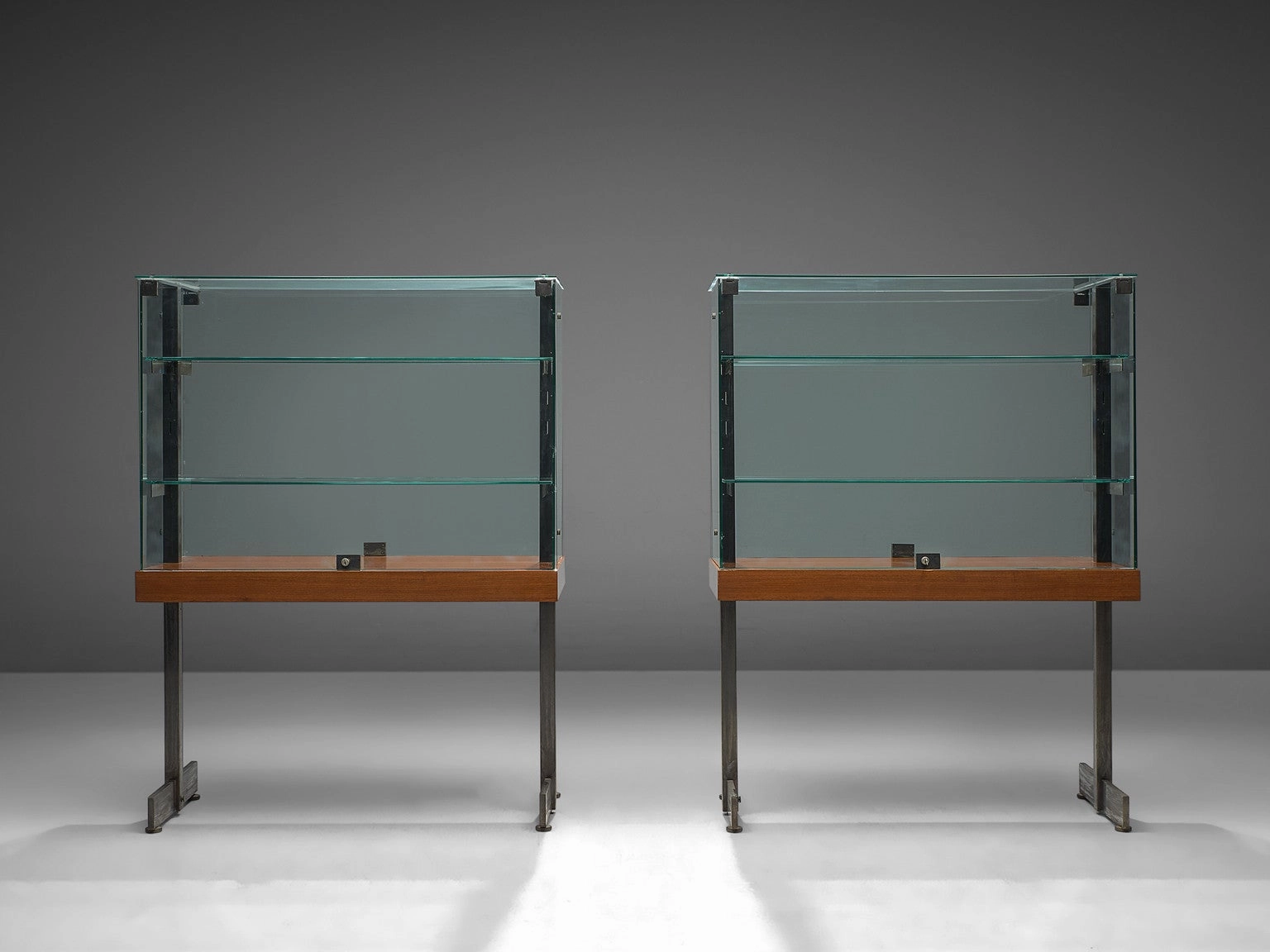 De Coene Showcases in Glass, Steel and Teak