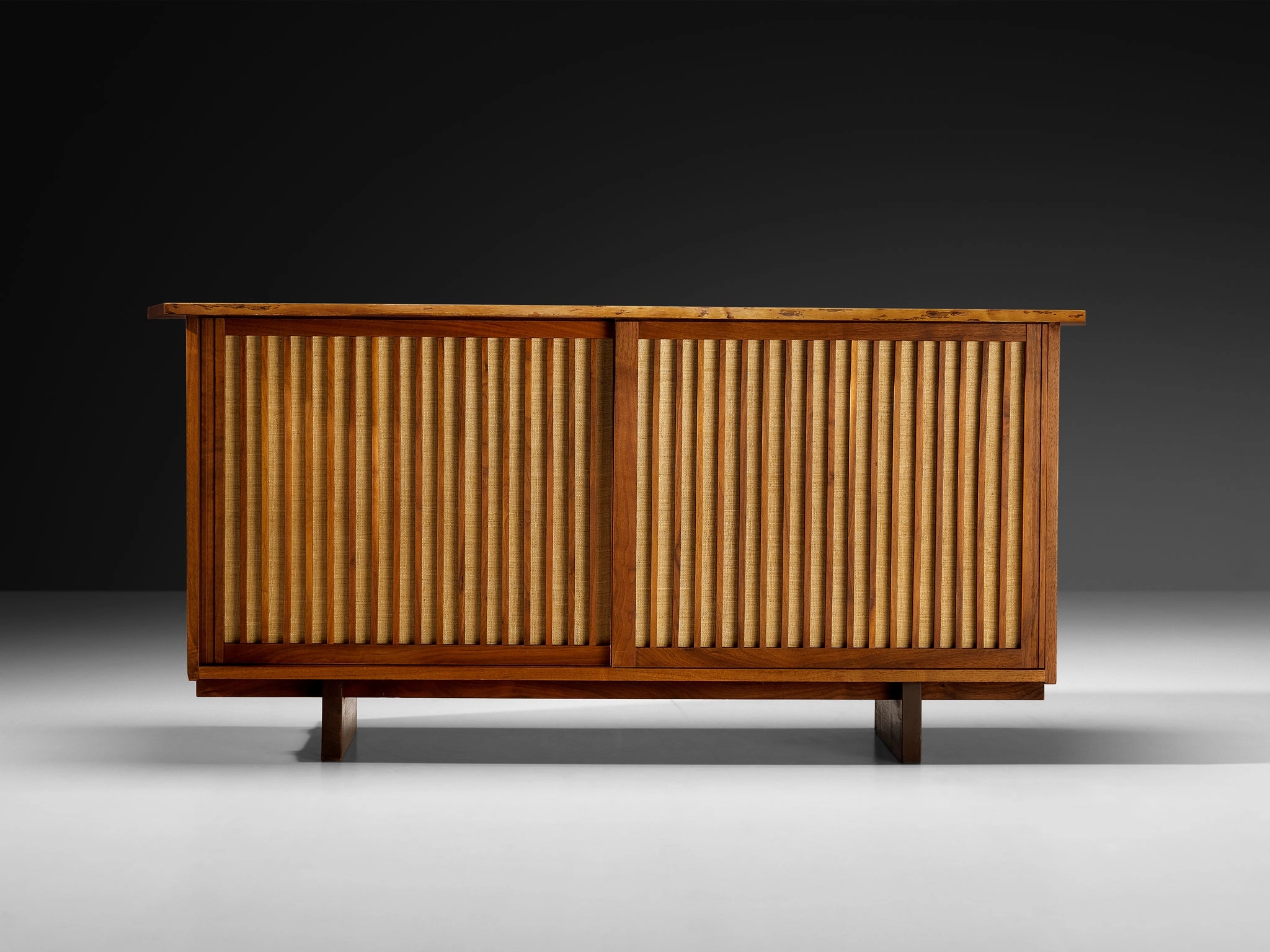 George Nakashima Sliding-Door Cabinet in Walnut and Pandanus Cloth