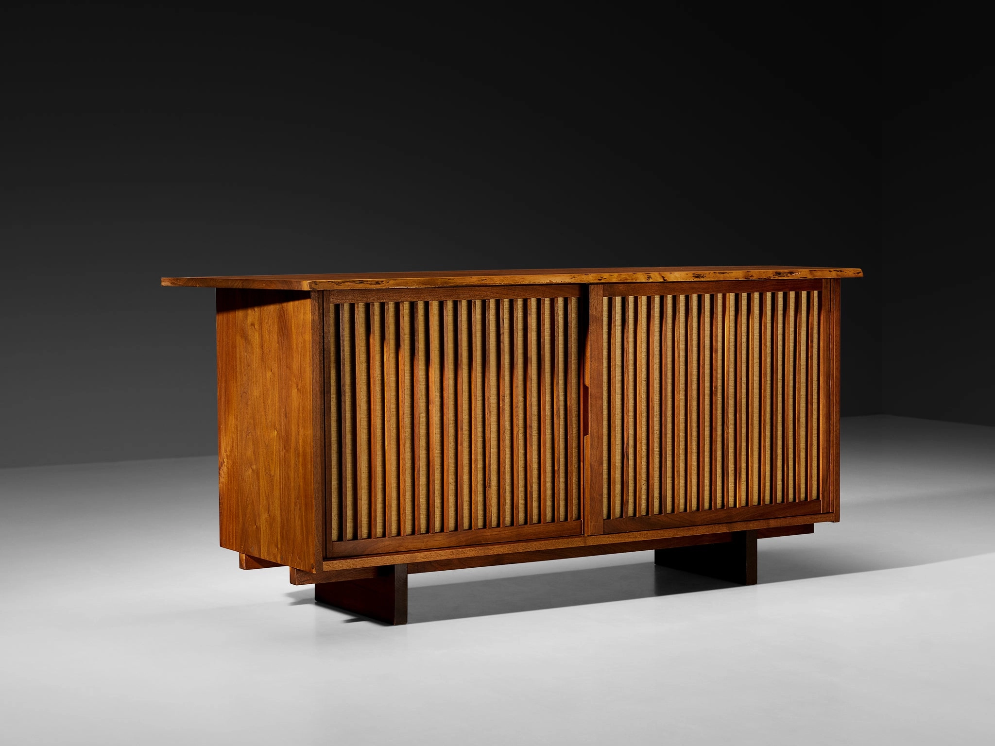 George Nakashima Sliding-Door Cabinet in Walnut and Pandanus Cloth