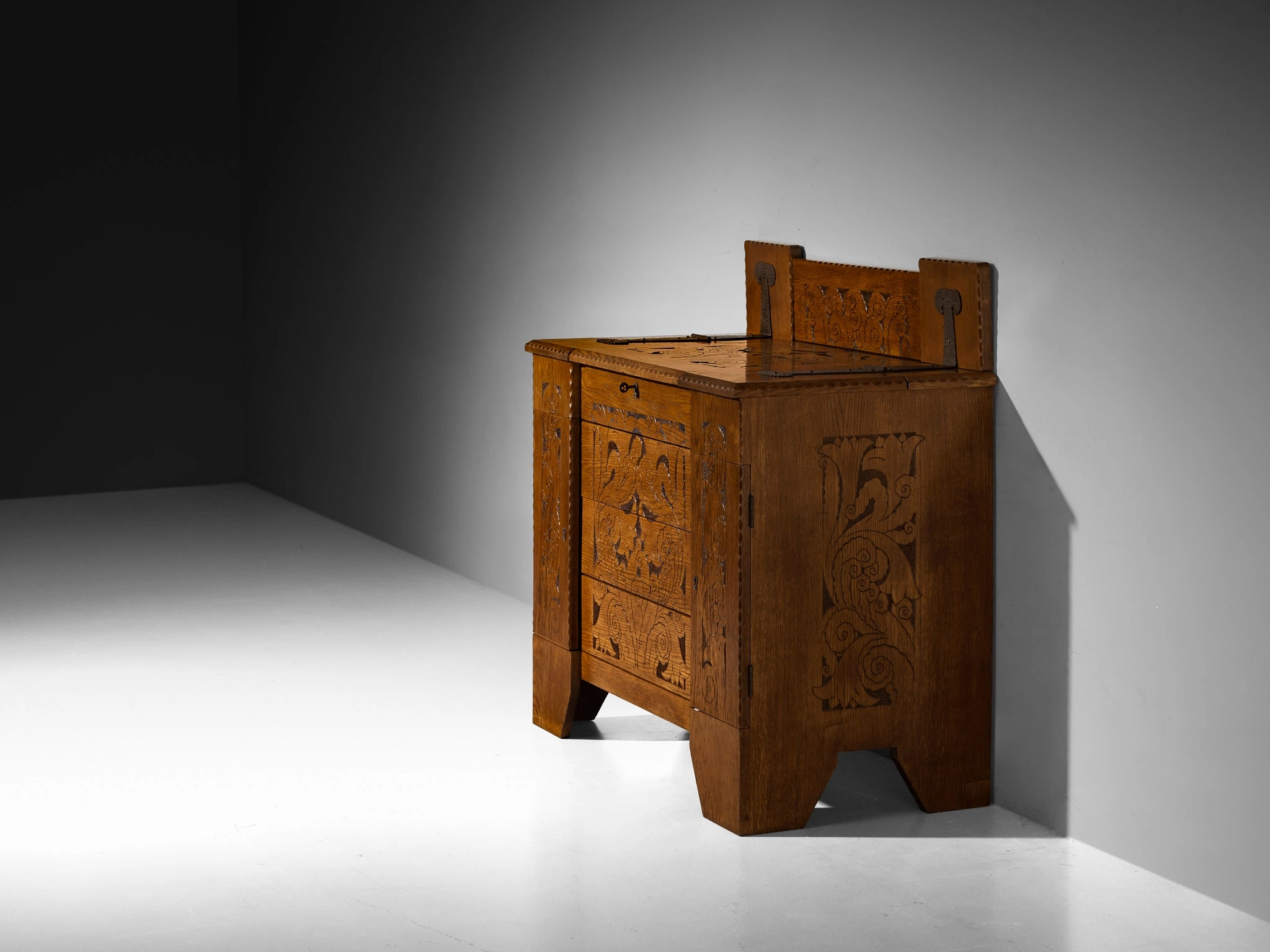 Gino Maggioni for Atelier di Varedo 1920s Chest of Drawers in Carved Oak