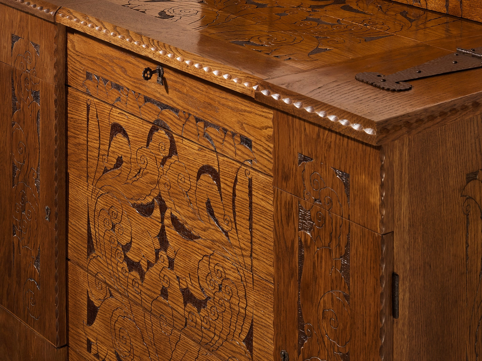 Gino Maggioni for Atelier di Varedo 1920s Chest of Drawers in Carved Oak