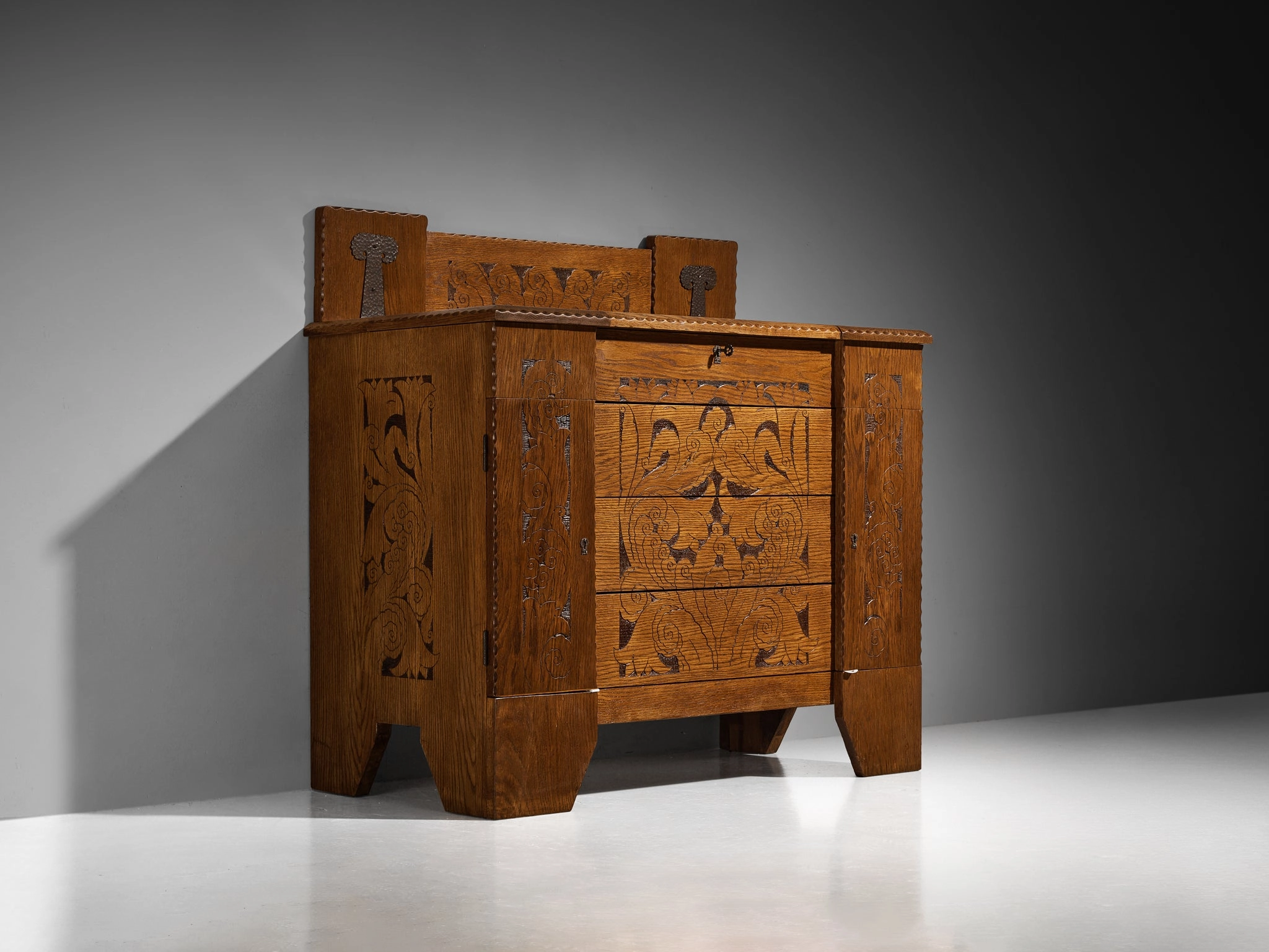 Gino Maggioni for Atelier di Varedo 1920s Chest of Drawers in Carved Oak