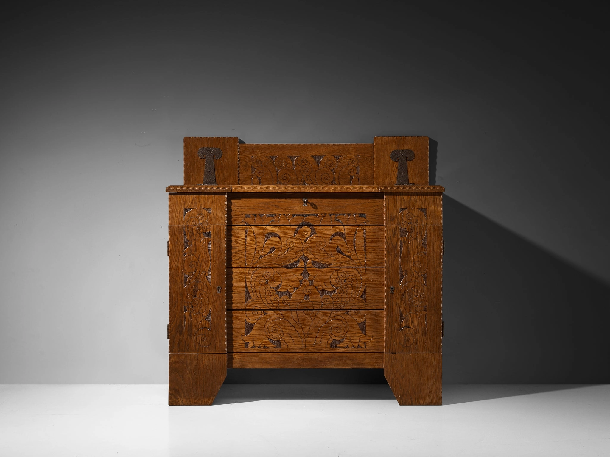 Gino Maggioni for Atelier di Varedo 1920s Chest of Drawers in Carved Oak
