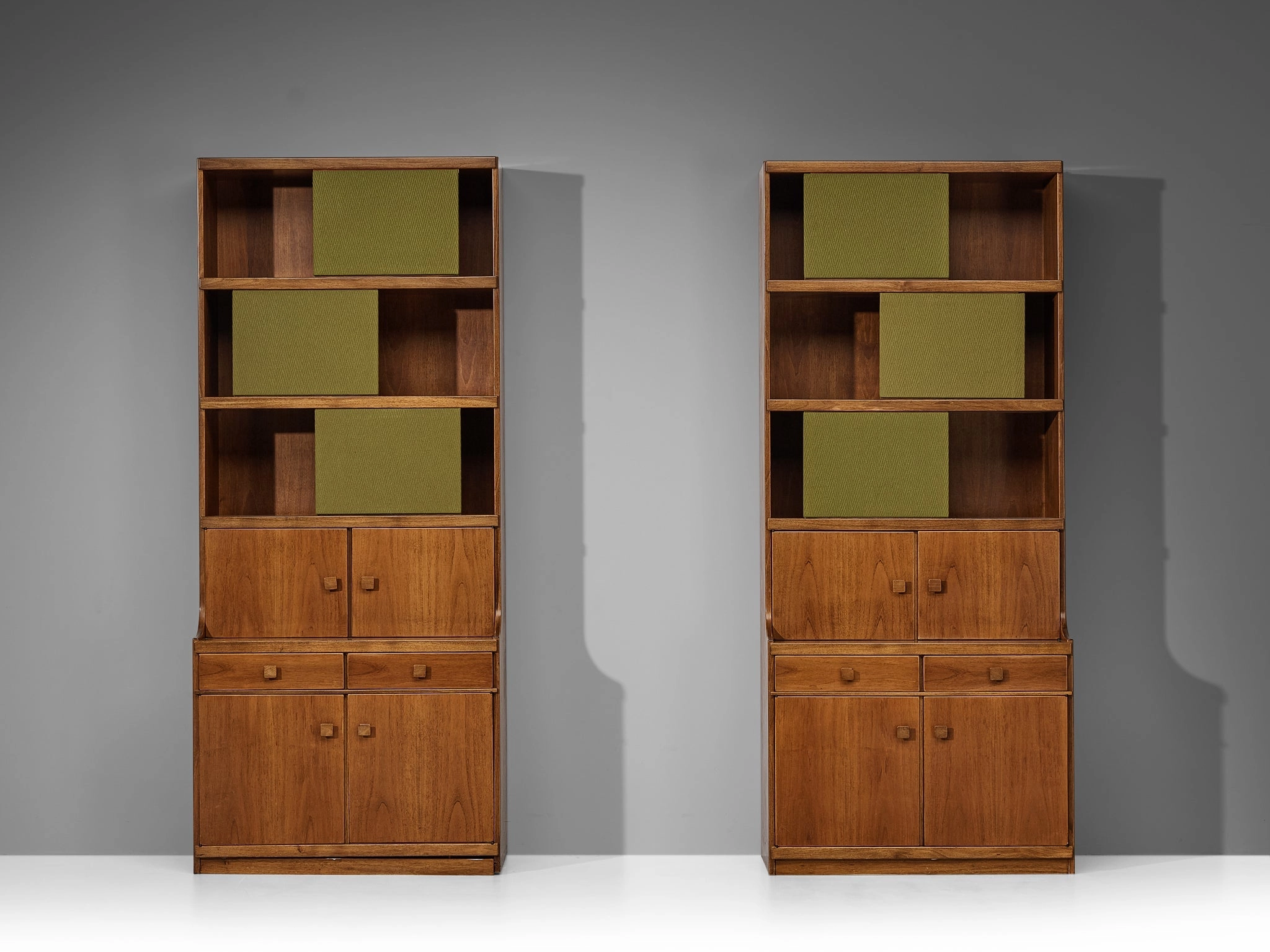 Ilmari Tapiovaara for La Permanente Mobili Cant Bookcases in Walnut