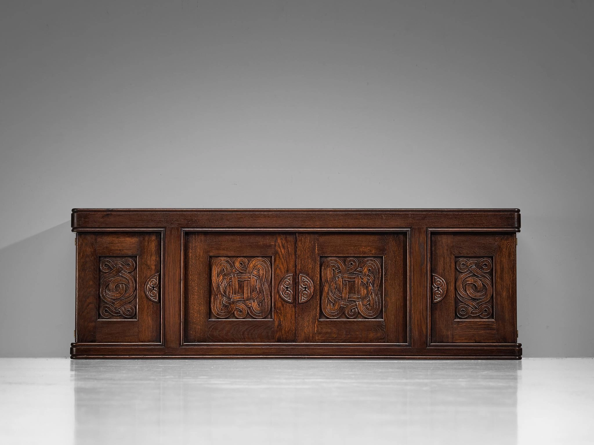 Joseph Savina Cabinet with Intricate Carvings in Oak