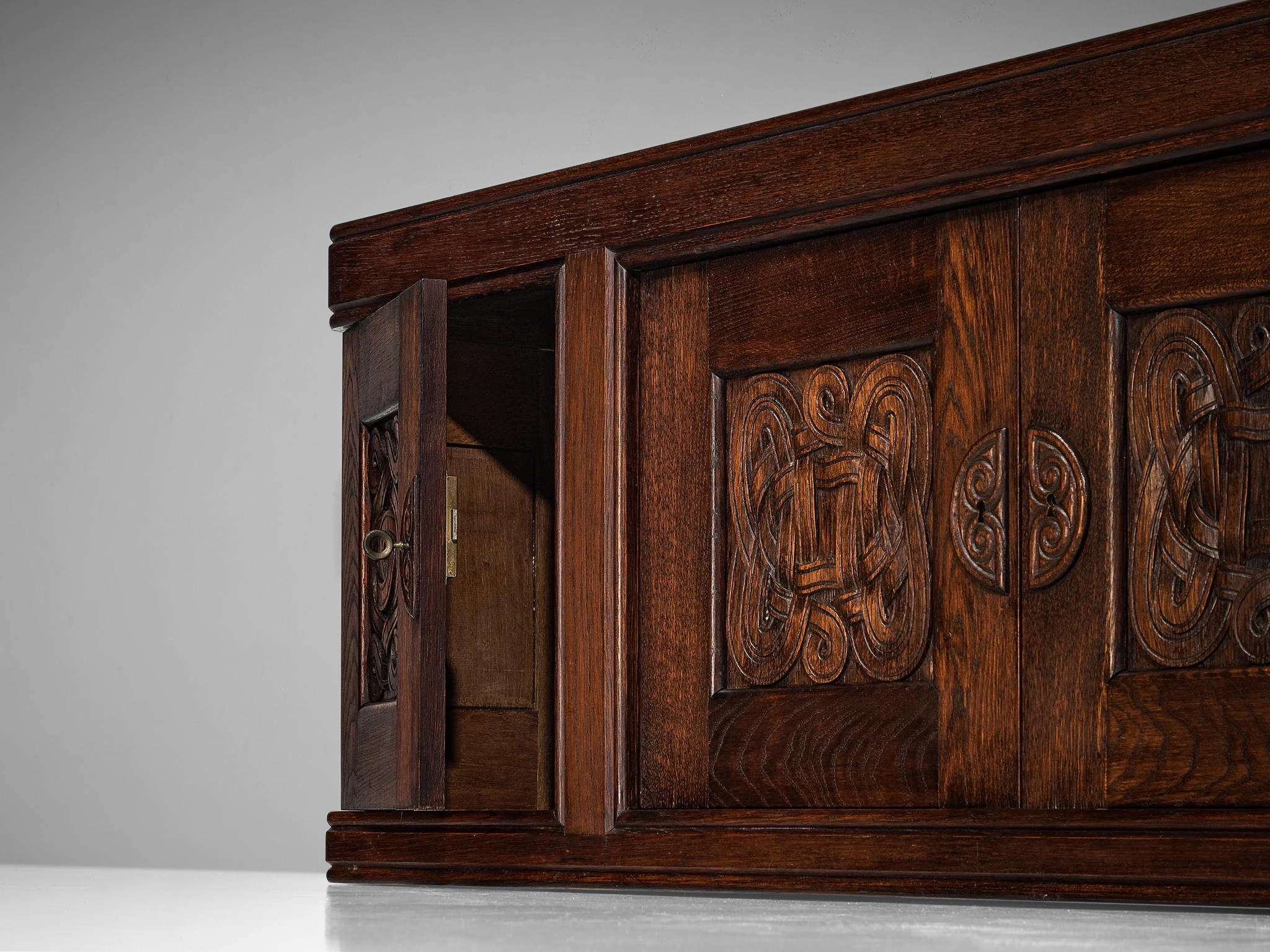 Joseph Savina Cabinet with Intricate Carvings in Oak
