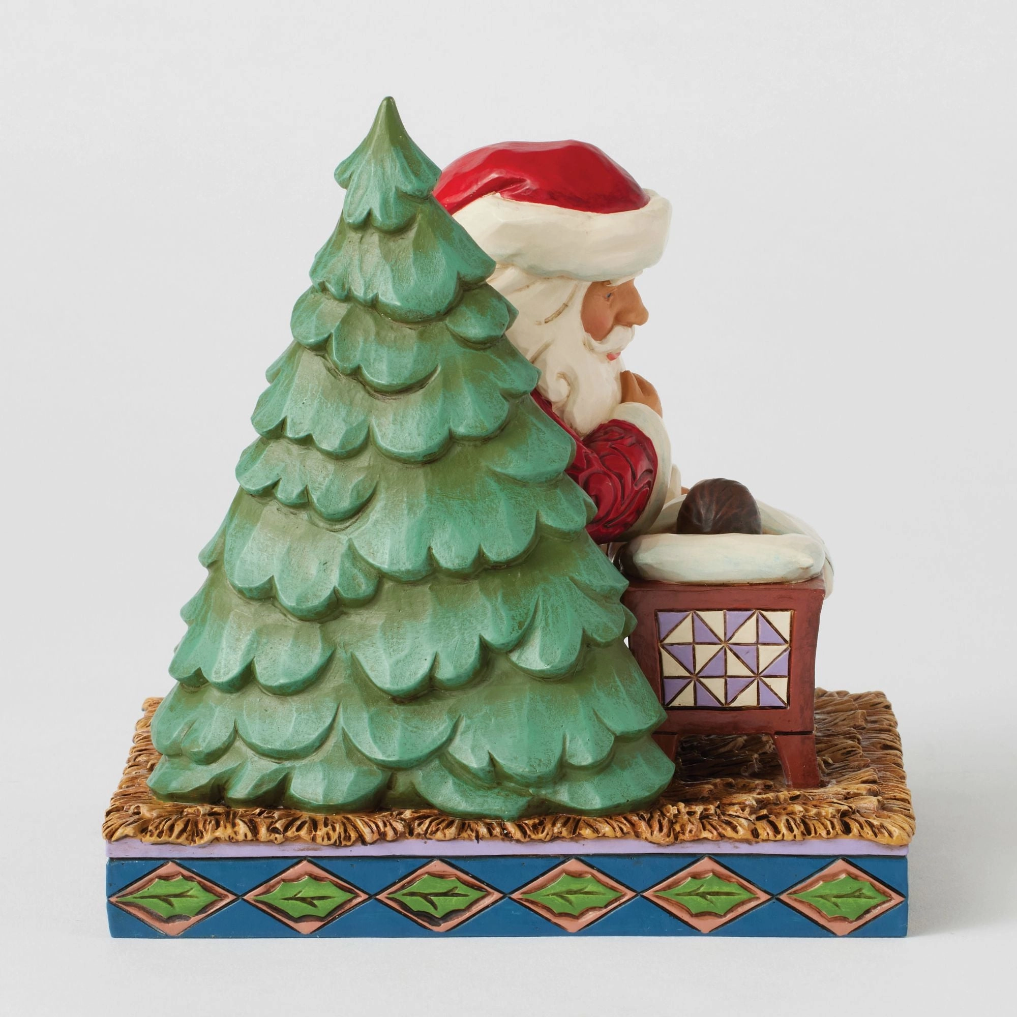 Santa Kneeling over Baby Jesus