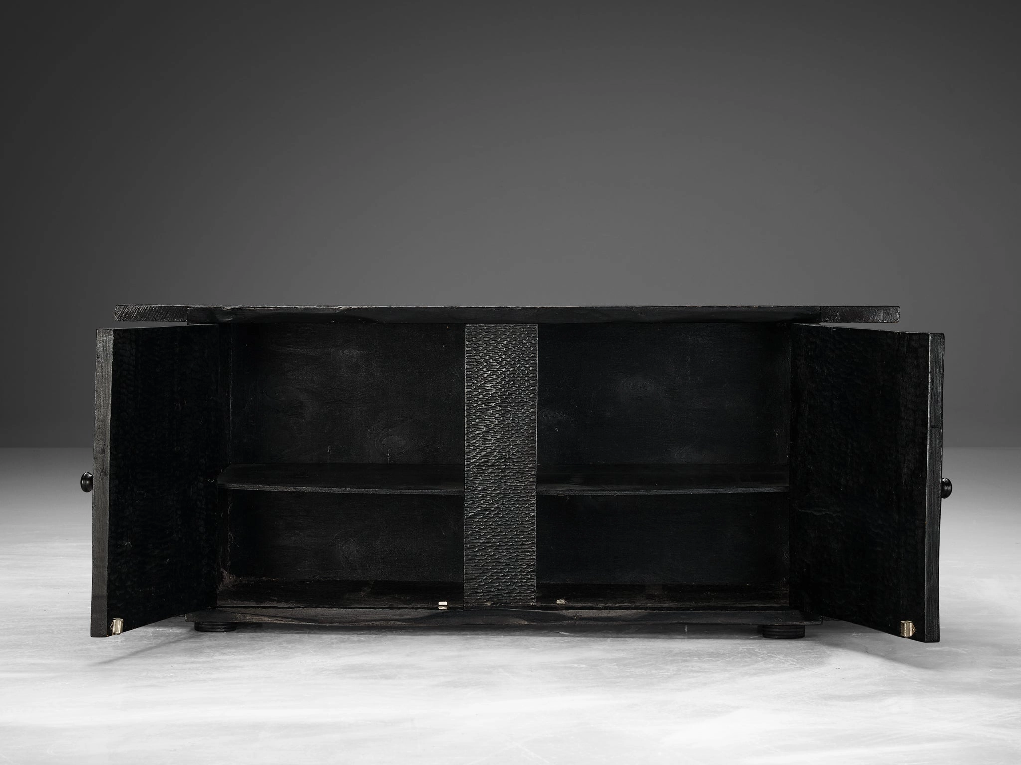 Sculptural Trunk in Black Lacquered Wood with Decorative Carvings