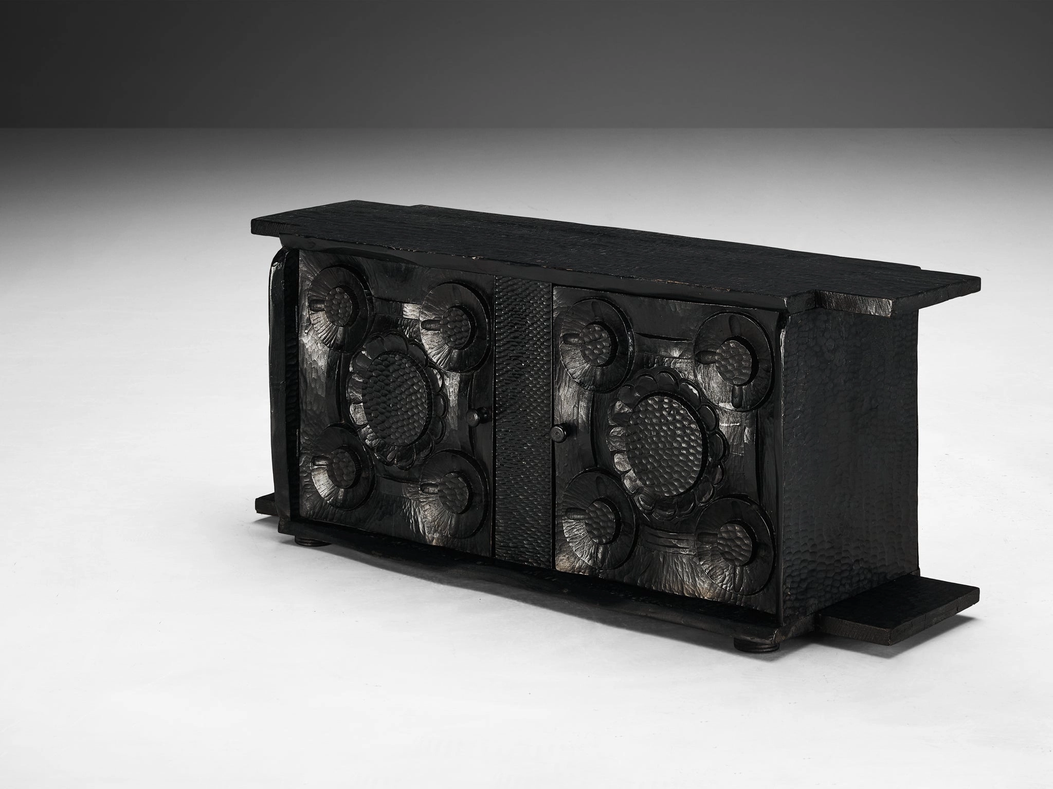 Sculptural Trunk in Black Lacquered Wood with Decorative Carvings