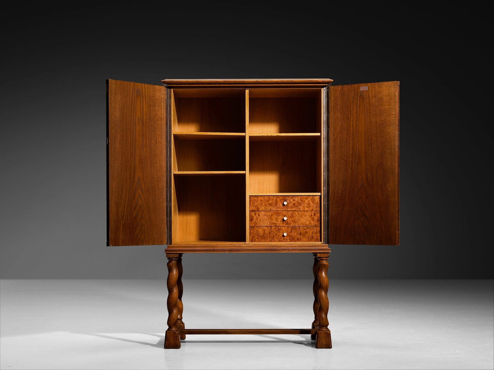 Swedish Art Deco High-Legged Cabinet with Carved Doors in Oak