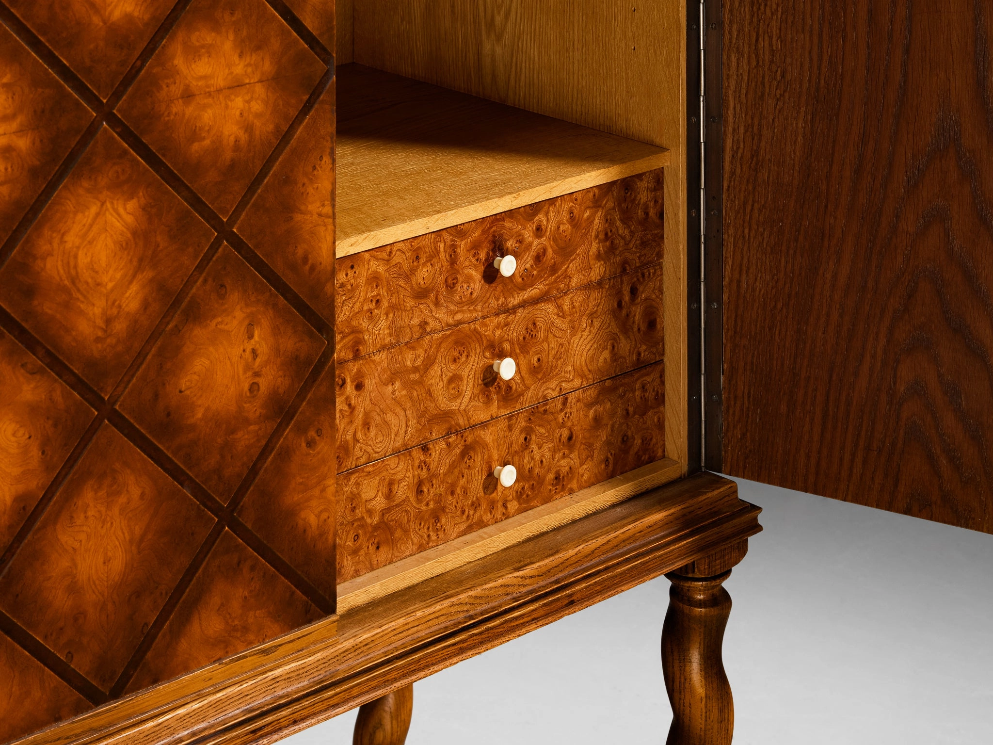Swedish Art Deco High-Legged Cabinet with Carved Doors in Oak